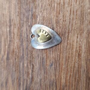 Sterling featuring 12k Gold‎ detailing heart pendant